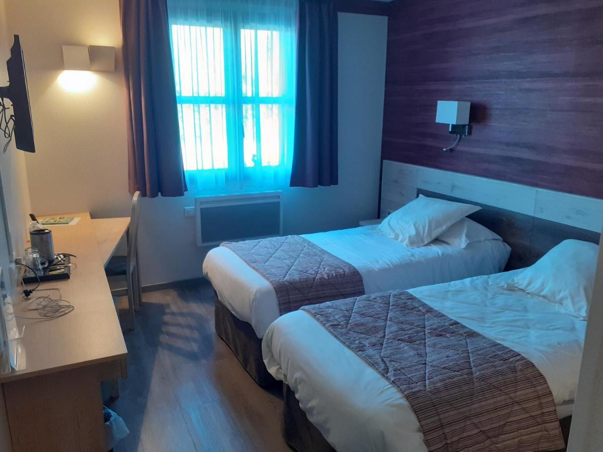 Logis Le Luth Hotel Mirecourt Bagian luar foto